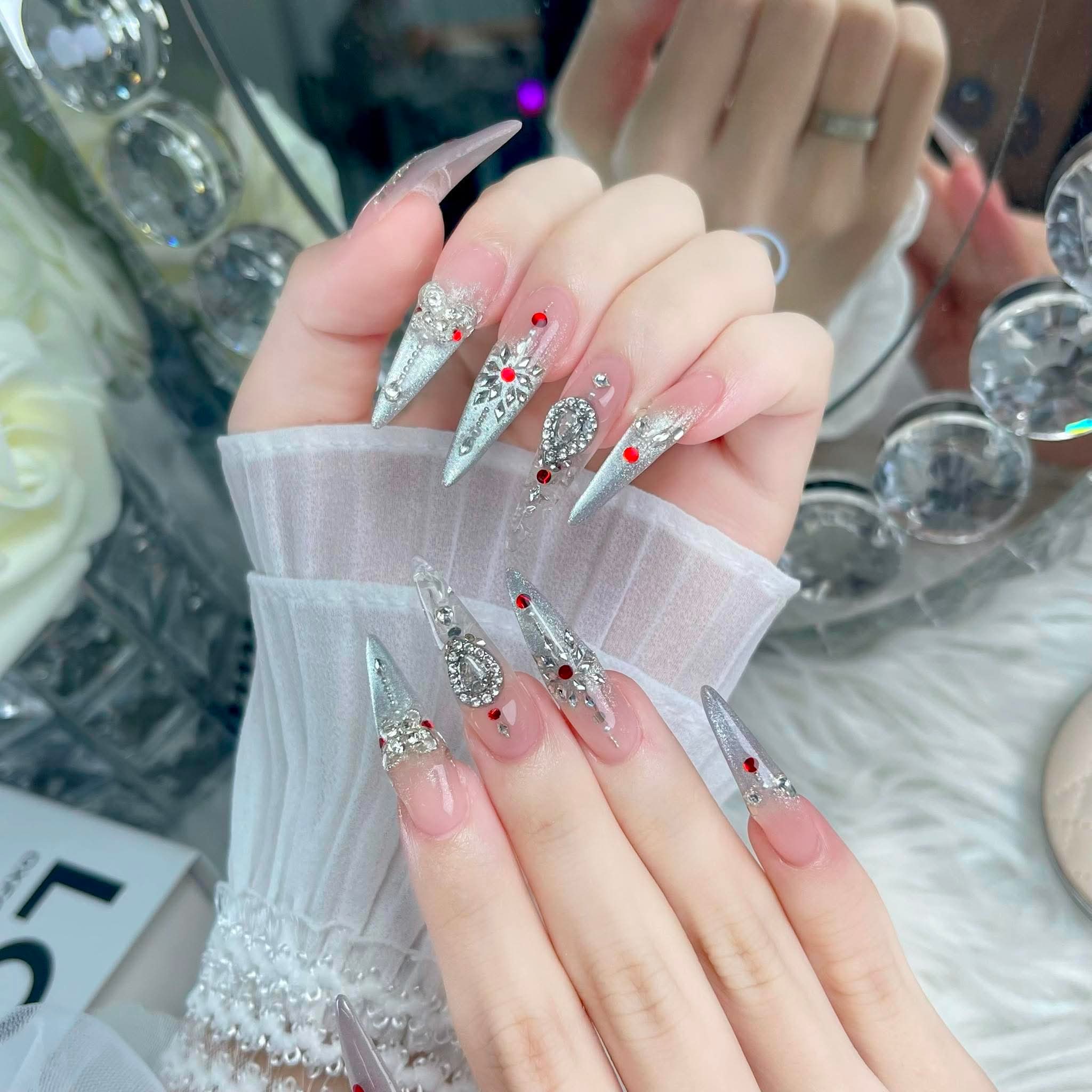 Long silver nails with abundant crystal parts